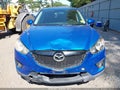 2013 Mazda CX-5 — photo 12 of 16 | VIN JM3KE4DEXD0152646