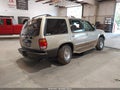 1999 Ford Explorer — photo 4 of 16 | VIN 1FMZU34X1XUB46071