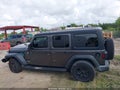 2021 Jeep Wrangler Unlimited — photo 14 of 16 | VIN 1C4HJXDG2MW789223