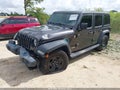 2021 Jeep Wrangler Unlimited — photo 2 of 16 | VIN 1C4HJXDG2MW789223