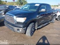 2012 Toyota Tundra — photo 2 of 16 | VIN 5TFUW5F1XCX228094