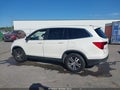 2018 Honda Pilot — photo 14 of 16 | VIN 5FNYF6H5XJB025625
