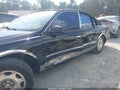 2001 Lincoln Continental — photo 6 of 11 | VIN 1LNHM97V71Y635387