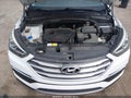 2018 Hyundai Santa Fe — photo 10 of 16 | VIN 5NMZT3LBXJH078140