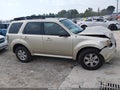 2010 Mercury Mariner — photo 14 of 17 | VIN 4M2CN9B76AKJ07955