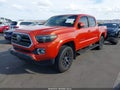 2016 Toyota Tacoma — photo 2 of 16 | VIN 5TFAX5GNXGX055149