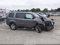 2011 Honda Pilot — photo 14 of 17 | VIN 5FNYF4H43BB075117