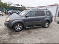 2011 Honda Pilot — photo 15 of 17 | VIN 5FNYF4H43BB075117