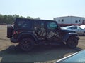 2023 Jeep Wrangler — photo 13 of 16 | VIN 1C4JJXN65PW592039