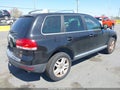 2005 Volkswagen Touareg — photo 4 of 11 | VIN WVGMM77L75D067088