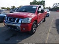 2012 Nissan Titan — photo 2 of 17 | VIN 1N6BA0EC3CN315002