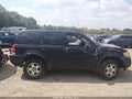 2003 Ford Escape — photo 13 of 16 | VIN 1FMCU94133KE20400
