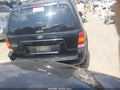 2003 Ford Escape — photo 16 of 16 | VIN 1FMCU94133KE20400