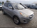 2010 Hyundai Tucson — photo 1 of 11 | VIN KM8JU3ACXAU110157