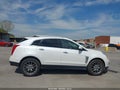 2016 Cadillac SRX — photo 13 of 17 | VIN 3GYFNDE38GS543583