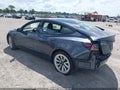 2022 Tesla Model 3 — photo 3 of 14 | VIN 5YJ3E1EA7NF329311