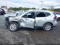 2018 Nissan Rogue — photo 14 of 18 | VIN KNMAT2MV6JP607400