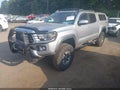2018 Toyota Tacoma — photo 2 of 17 | VIN 5TFCZ5AN5JX122923