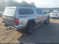 2018 Toyota Tacoma — photo 4 of 17 | VIN 5TFCZ5AN5JX122923