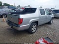 2011 Honda Ridgeline — photo 4 of 18 | VIN 5FPYK1F57BB010011