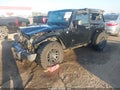 2012 Jeep Wrangler — photo 2 of 12 | VIN 1C4AJWAG0CL154758