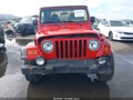 2004 Jeep Wrangler — photo 12 of 16 | VIN 1J4FA39S64P726658