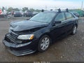 2017 Volkswagen Jetta — photo 2 of 18 | VIN 3VW2B7AJ7HM413669