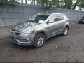 2018 Hyundai Santa Fe — photo 2 of 16 | VIN 5XYZTDLB2JG559841