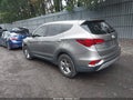 2018 Hyundai Santa Fe — photo 3 of 16 | VIN 5XYZTDLB2JG559841