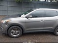 2018 Hyundai Santa Fe — photo 6 of 16 | VIN 5XYZTDLB2JG559841