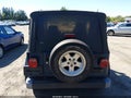 2005 Jeep Wrangler — photo 16 of 17 | VIN 1J4FA39S35P364323