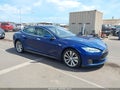 2015 Tesla Model S — photo 1 of 14 | VIN 5YJSA1S28FF091488