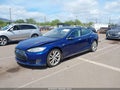 2015 Tesla Model S — photo 2 of 14 | VIN 5YJSA1S28FF091488
