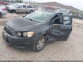 2015 Chevrolet Sonic — photo 2 of 16 | VIN 1G1JC6SG0F4107830