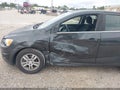 2015 Chevrolet Sonic — photo 6 of 16 | VIN 1G1JC6SG0F4107830