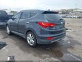 2014 Hyundai Santa Fe — photo 3 of 17 | VIN 5XYZU3LA4EG190677