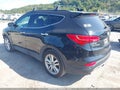2016 Hyundai Santa Fe — photo 3 of 16 | VIN 5XYZWDLA5GG362024