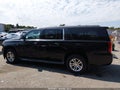 2015 Chevrolet Suburban 1500 — photo 14 of 17 | VIN 1GNSKJKC3FR707802