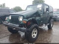 1999 Jeep Wrangler — photo 2 of 17 | VIN 1J4FY29P9XP472398
