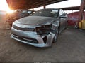 2018 Kia Optima — photo 2 of 16 | VIN 5XXGV4L2XJG203224
