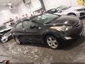 2013 Hyundai Elantra — photo 13 of 17 | VIN KMHDH4AE0DU925920