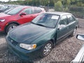 2002 Toyota Corolla — photo 2 of 11 | VIN 1NXBR12E92Z593636