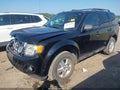 2012 Ford Escape — photo 2 of 11 | VIN 1FMCU0D77CKA99770