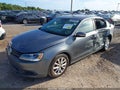 2014 Volkswagen Jetta — photo 2 of 16 | VIN 3VWD17AJ3EM377034