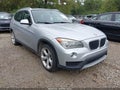 2013 BMW X1 — photo 1 of 11 | VIN WBAVM5C51DVV90326