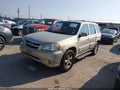 2005 Mazda Tribute — photo 2 of 11 | VIN 4F2CZ06115KM04908