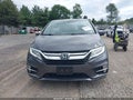 2018 Honda Odyssey — photo 12 of 17 | VIN 5FNRL6H91JB089536