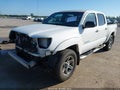 2014 Toyota Tacoma — photo 2 of 17 | VIN 3TMJU4GNXEM157217