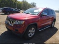 2011 Jeep Grand Cherokee — photo 2 of 11 | VIN 1J4RR4GT1BC590838