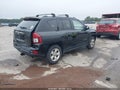 2015 Jeep Compass — photo 4 of 16 | VIN 1C4NJCBA6FD190897